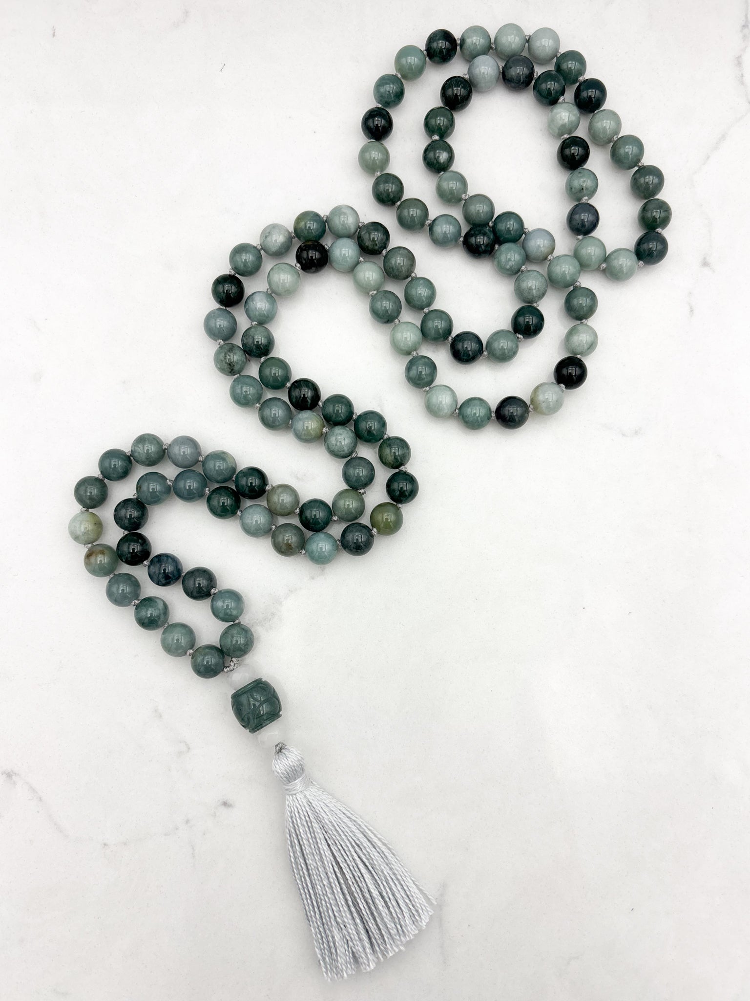 burma jade gemstone mala with white and green jade guru bead and gray tassel | radiant malas | handmade in boulder, colorado