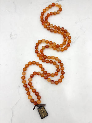 carnelian gemstone mala necklace with brass pendant | radiant malas  | handmade in boulder, colorado