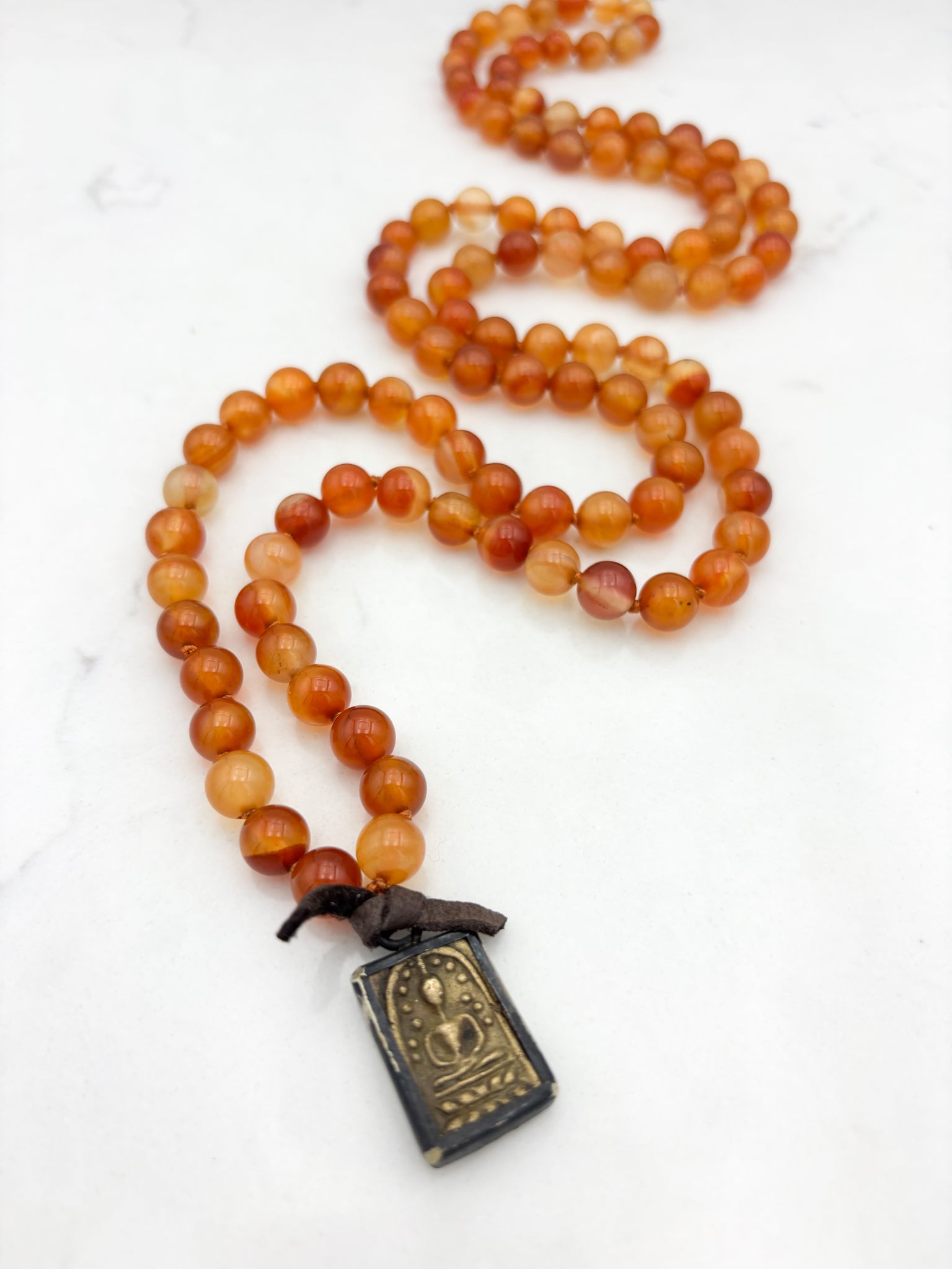 carnelian gemstone mala necklace with brass pendant | radiant malas  | handmade in boulder, colorado