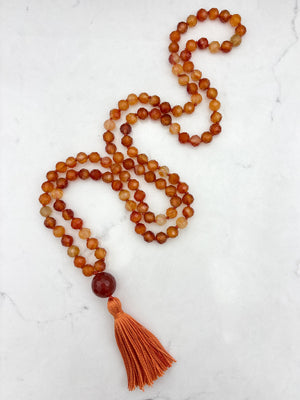 carnelian gemstone mala necklace with carnelian guru bead and orange tassel | radiant malas  | handmade in boulder, colorado