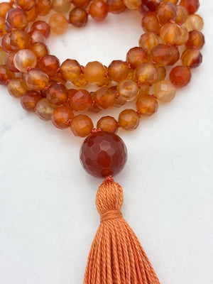 carnelian gemstone mala necklace with carnelian guru bead and orange tassel | radiant malas  | handmade in boulder, colorado