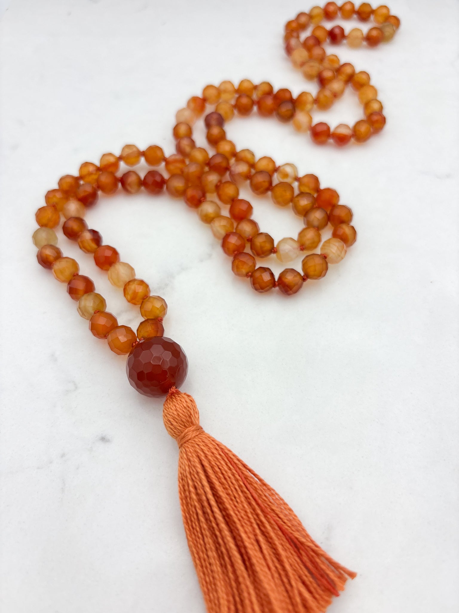 carnelian gemstone mala necklace with carnelian guru bead and orange tassel | radiant malas  | handmade in boulder, colorado