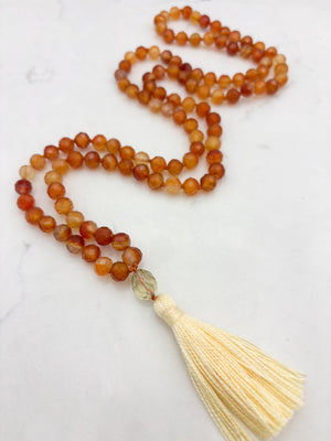 carnelian gemstone mala necklace with lemon quartz guru bead and yellow tassel | radiant malas  | handmade in boulder, colorado