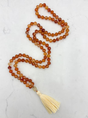carnelian gemstone mala necklace with lemon quartz guru bead and yellow tassel | radiant malas  | handmade in boulder, colorado