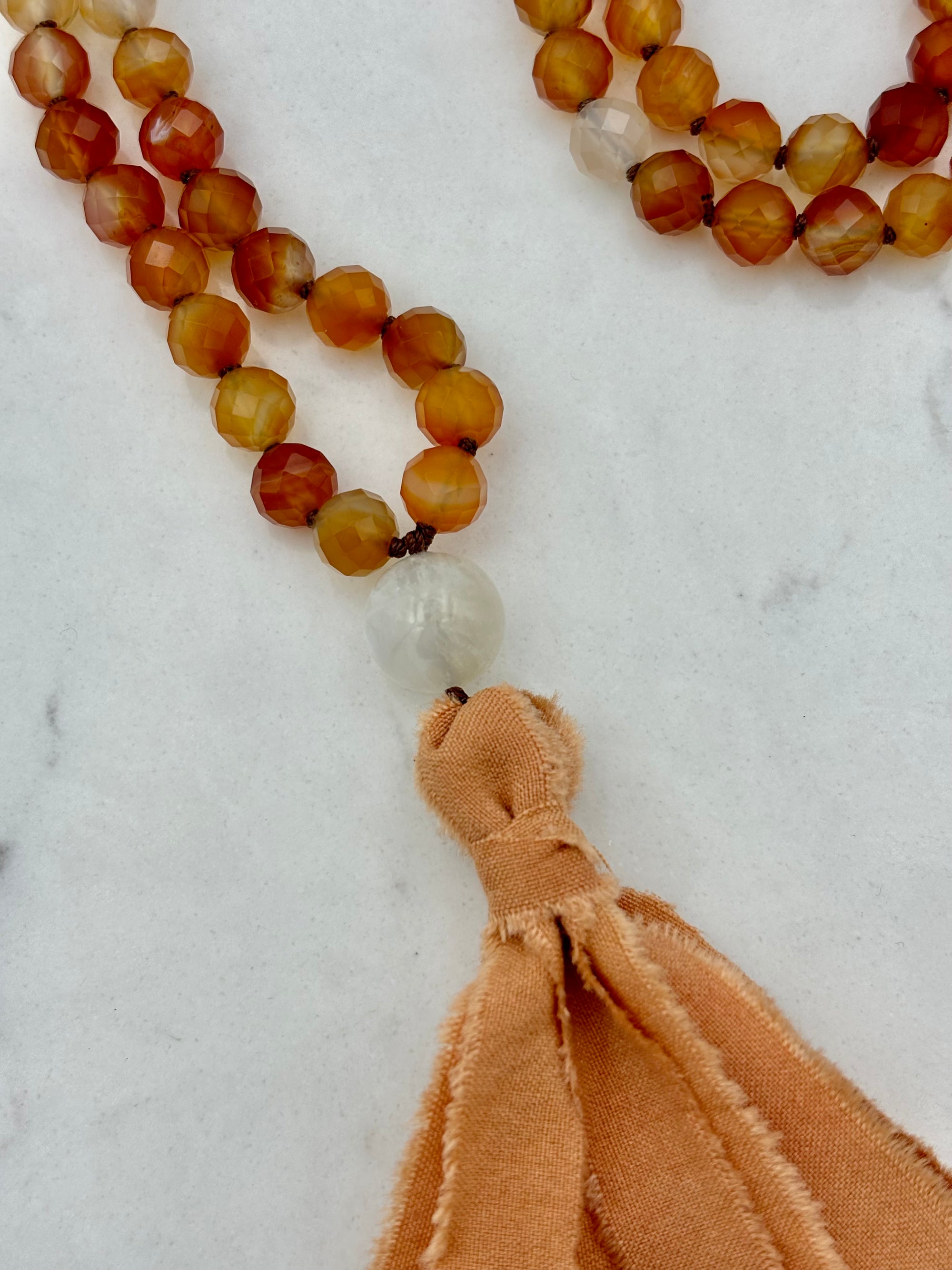 carnelian gemstone mala with silk tassel | radiant malas | handmade in boulder, colorado