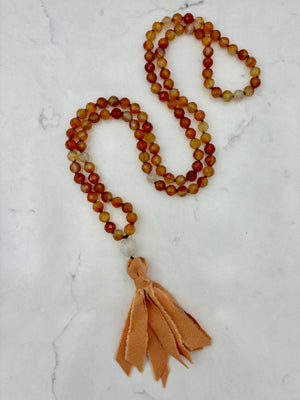 carnelian gemstone mala with silk tassel | radiant malas | handmade in boulder, colorado