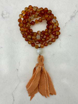 carnelian gemstone mala with silk tassel | radiant malas | handmade in boulder, colorado