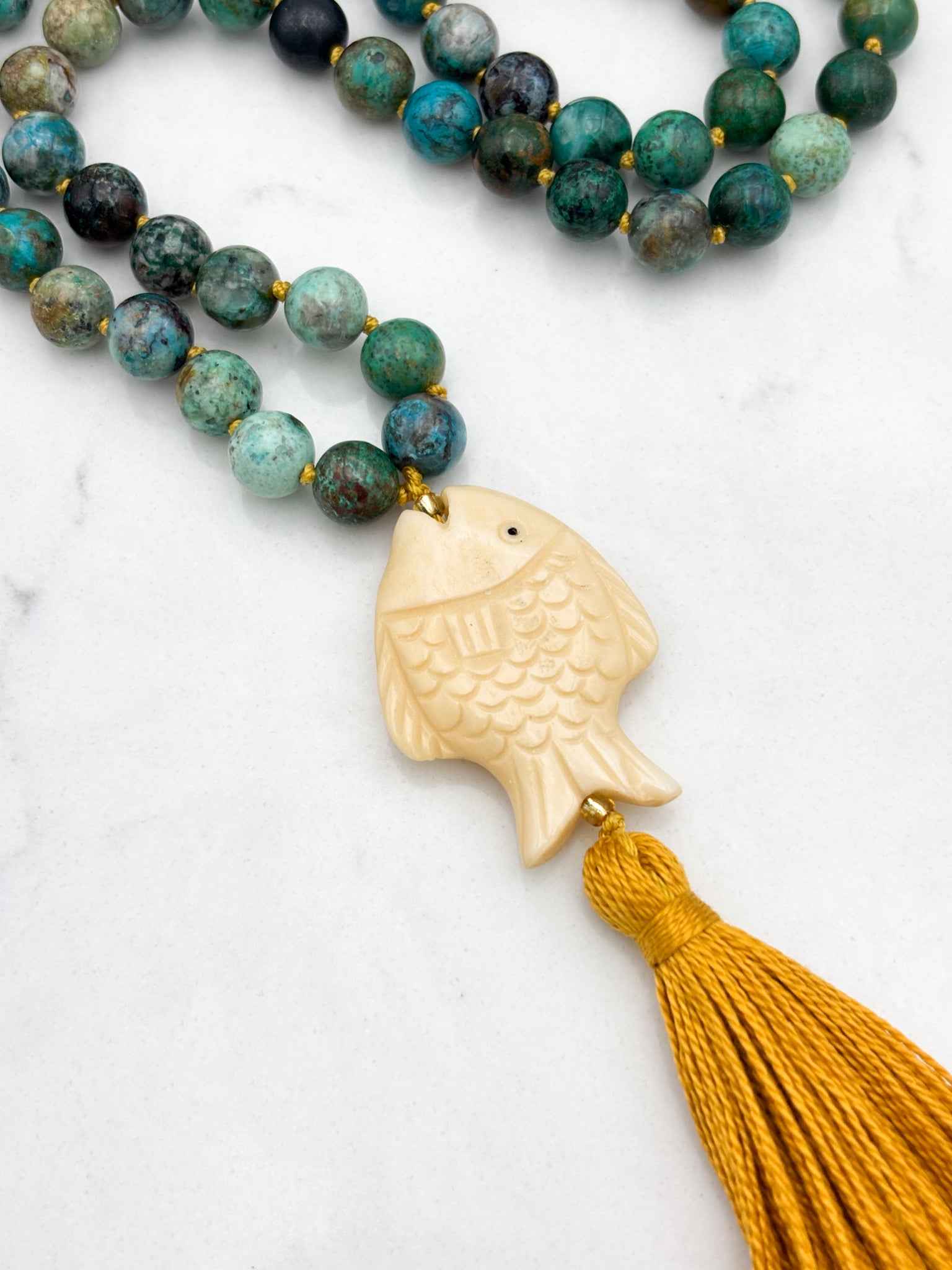 chrysocolla gemstone mala necklace  with fish-carved bone guru bead and gold tassel| radiant malas | handmade in boulder, colorado
