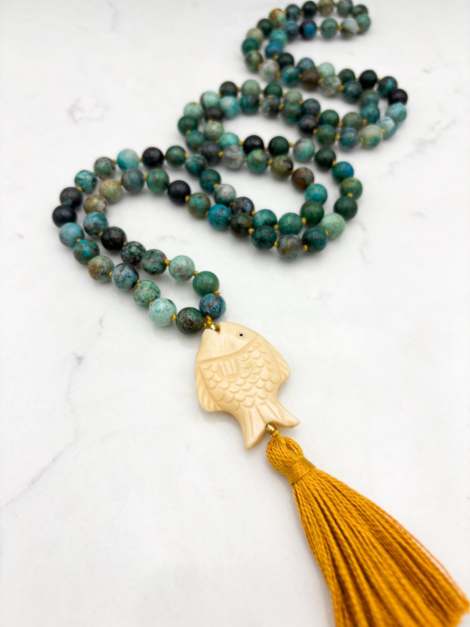 chrysocolla gemstone mala necklace  with fish-carved bone guru bead and gold tassel| radiant malas | handmade in boulder, colorado