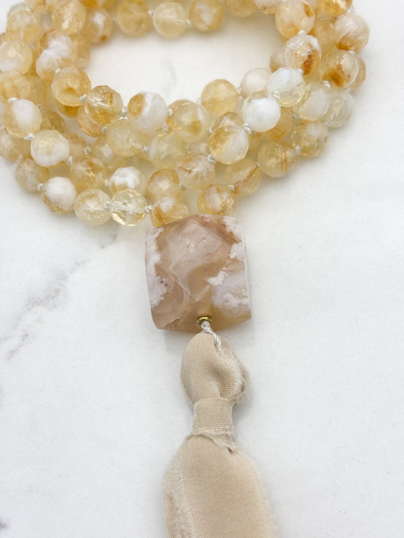 Citrine gemstone mala necklace  with cherry blossom agate guru bead and beige silk tassel | radiant malas | handmade in boulder, colorado	