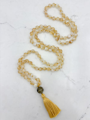 citrine gemstone mala necklace with green lampwork glass guru bead and gold tassel | radiant malas | handmade in boulder, colorado