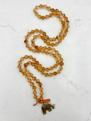 citrine gemstone mala necklace with brass elephant pendant | radiant malas | handmade in boulder, colorado