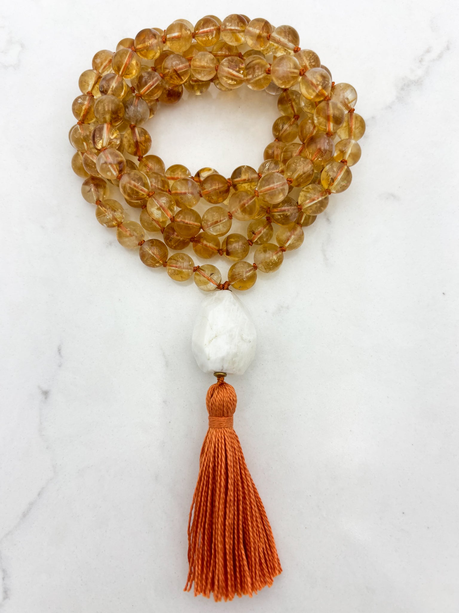 citrine gemstone mala necklace with Moonstone guru bead and orange tassel | radiant malas | handmade in boulder, colorado