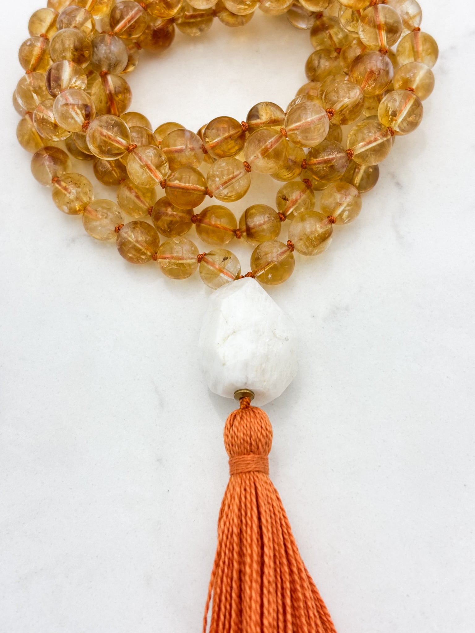 citrine gemstone mala necklace with Moonstone guru bead and orange tassel | radiant malas | handmade in boulder, colorado
