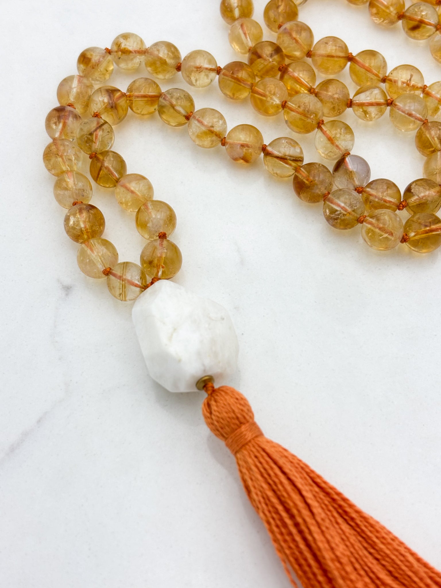 citrine gemstone mala necklace with Moonstone guru bead and orange tassel | radiant malas | handmade in boulder, colorado