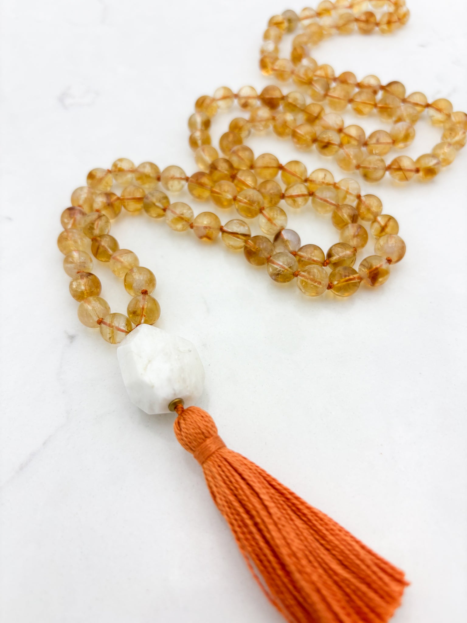 citrine gemstone mala necklace with Moonstone guru bead and orange tassel | radiant malas | handmade in boulder, colorado