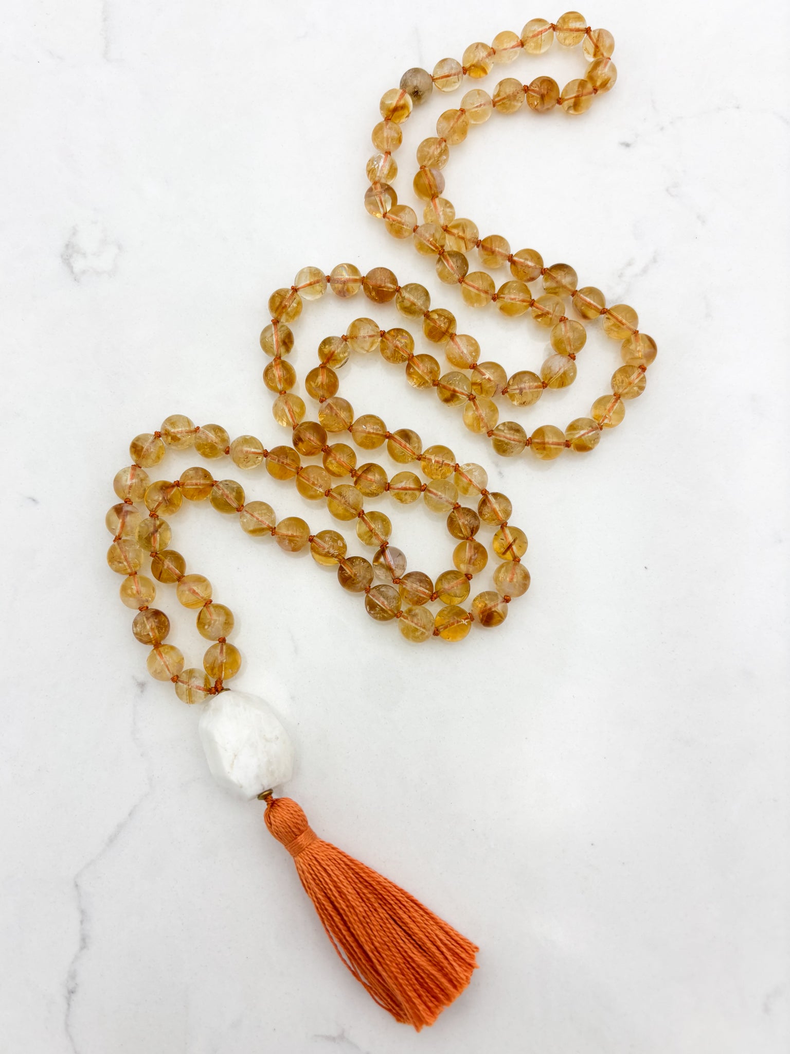 citrine gemstone mala necklace with Moonstone guru bead and orange tassel | radiant malas | handmade in boulder, colorado
