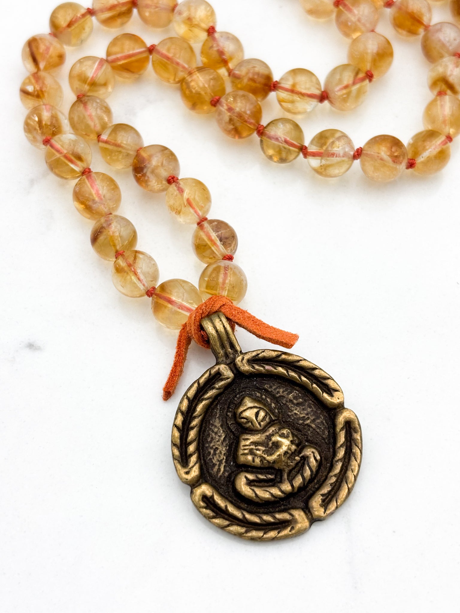 citrine gemstone mala necklace with round brass pendant | radiant malas | handmade in boulder, colorado