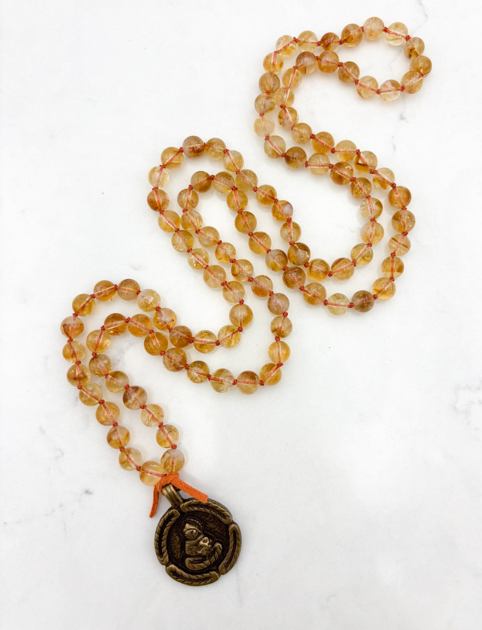 citrine gemstone mala necklace with round brass pendant | radiant malas | handmade in boulder, colorado