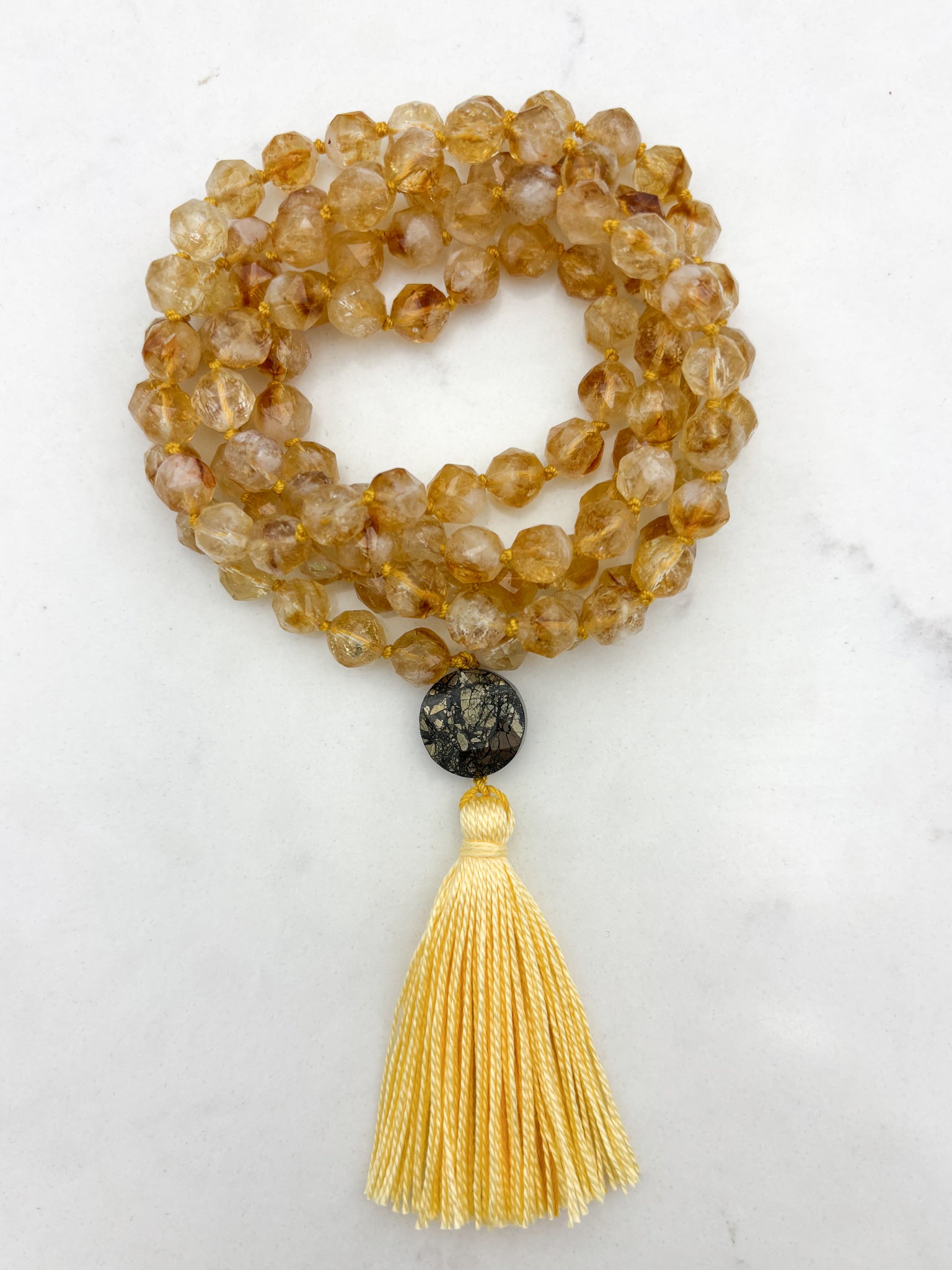 citrine gemstone mala necklace with pyrite guru bead and yellow tassel | radiant malas | handmade in boulder, colorado