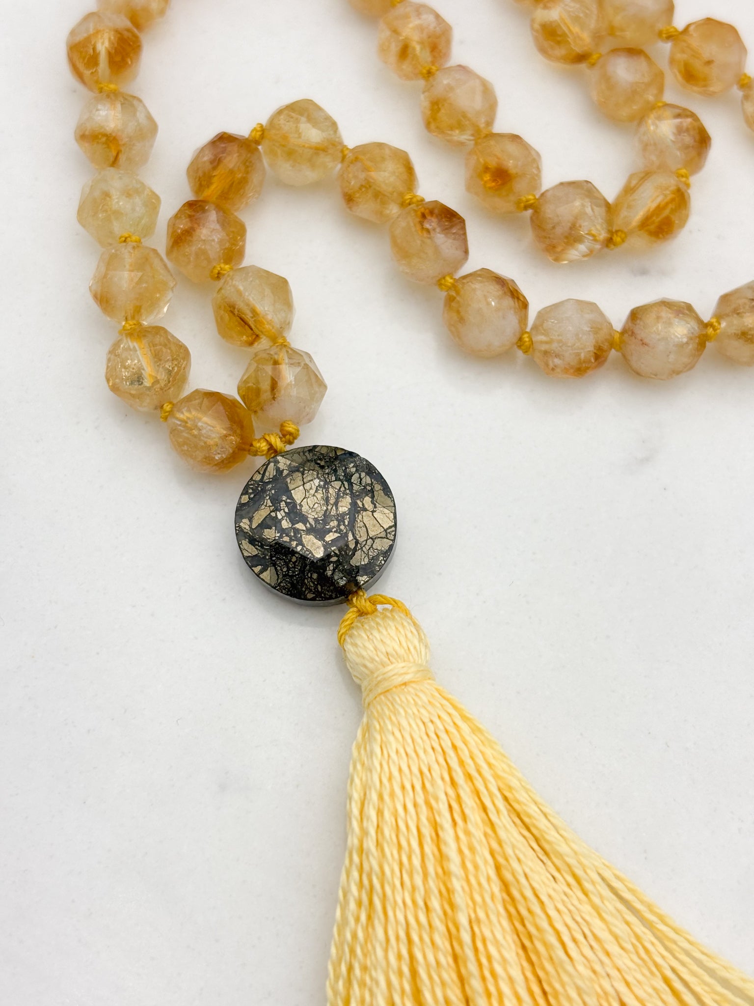 citrine gemstone mala necklace with pyrite guru bead and yellow tassel | radiant malas | handmade in boulder, colorado