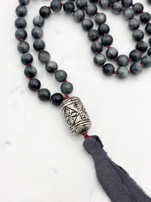 eagle eye gemstone mala necklace with etched silver guru bead and gray silk ribbon tassel | radiant malas | handmade in boulder, colorado