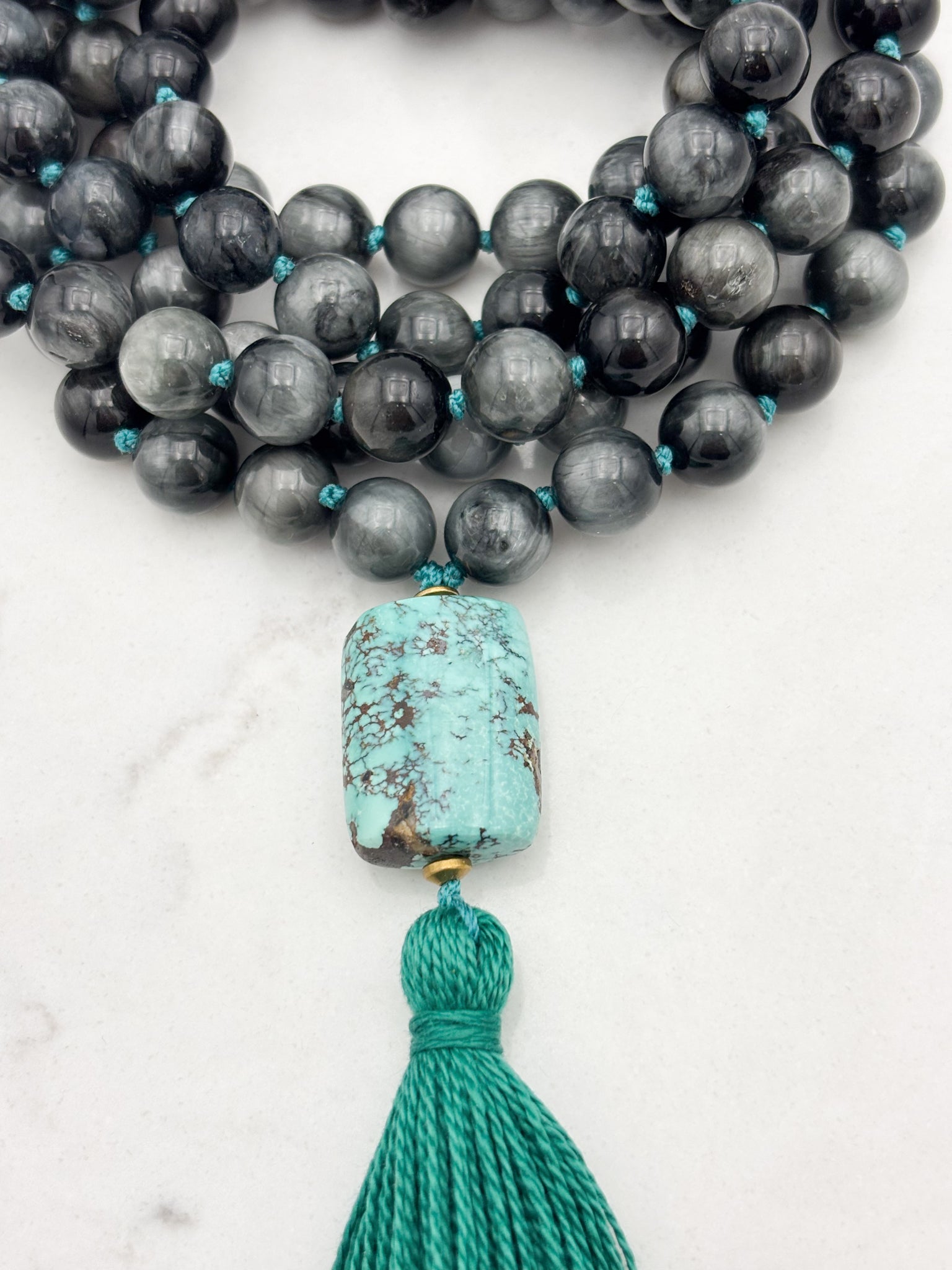 eagle eye gemstone mala necklace with turquoise guru bead and teal tassel | radiant malas | handmade in boulder, colorado