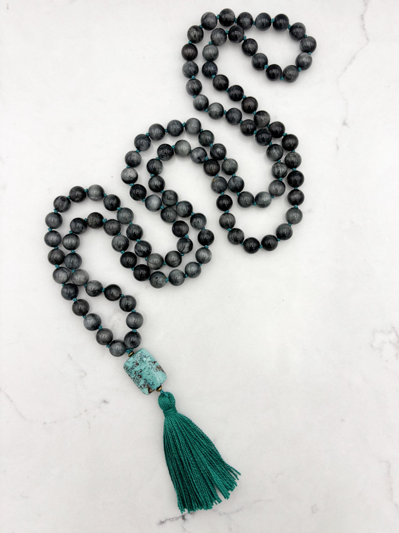 eagle eye gemstone mala necklace with turquoise guru bead and teal tassel | radiant malas | handmade in boulder, colorado
