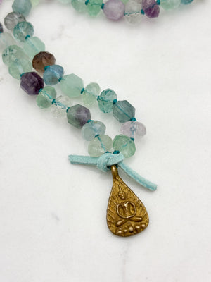 fluorite gemstone mala with brass Buddha pendant | radiant malas  handmade in boulder, colorado