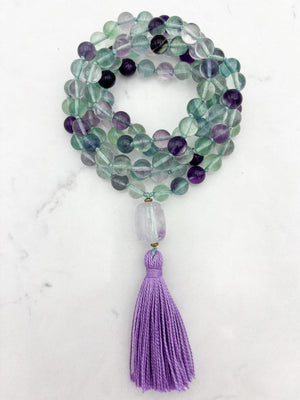 fluorite gemstone mala with amethyst guru bead and purple tassel | radiant malas  handmade in boulder, colorado