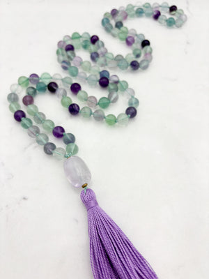 fluorite gemstone mala with amethyst guru bead and purple tassel | radiant malas  handmade in boulder, colorado