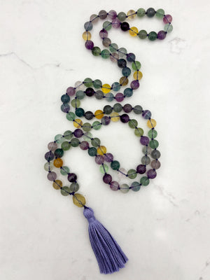 fluorite gemstone mala with citrine guru bead and lilac tassel | radiant malas  handmade in boulder, colorado