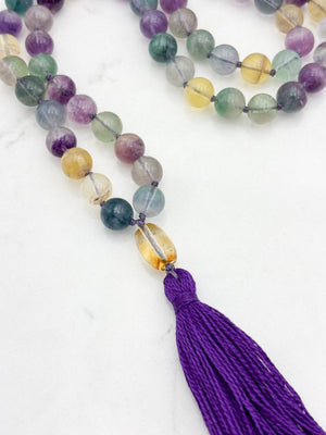 fluorite gemstone mala with citrine guru bead and purple tassel | radiant malas  handmade in boulder, colorado