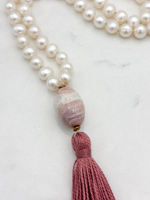 freshwater pearl mala necklace with fossil coral guru bead and rose pink tassel | radiant malas | handmade in boulder, colorado