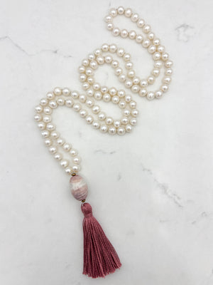 freshwater pearl mala necklace with fossil coral guru bead and rose pink tassel | radiant malas | handmade in boulder, colorado