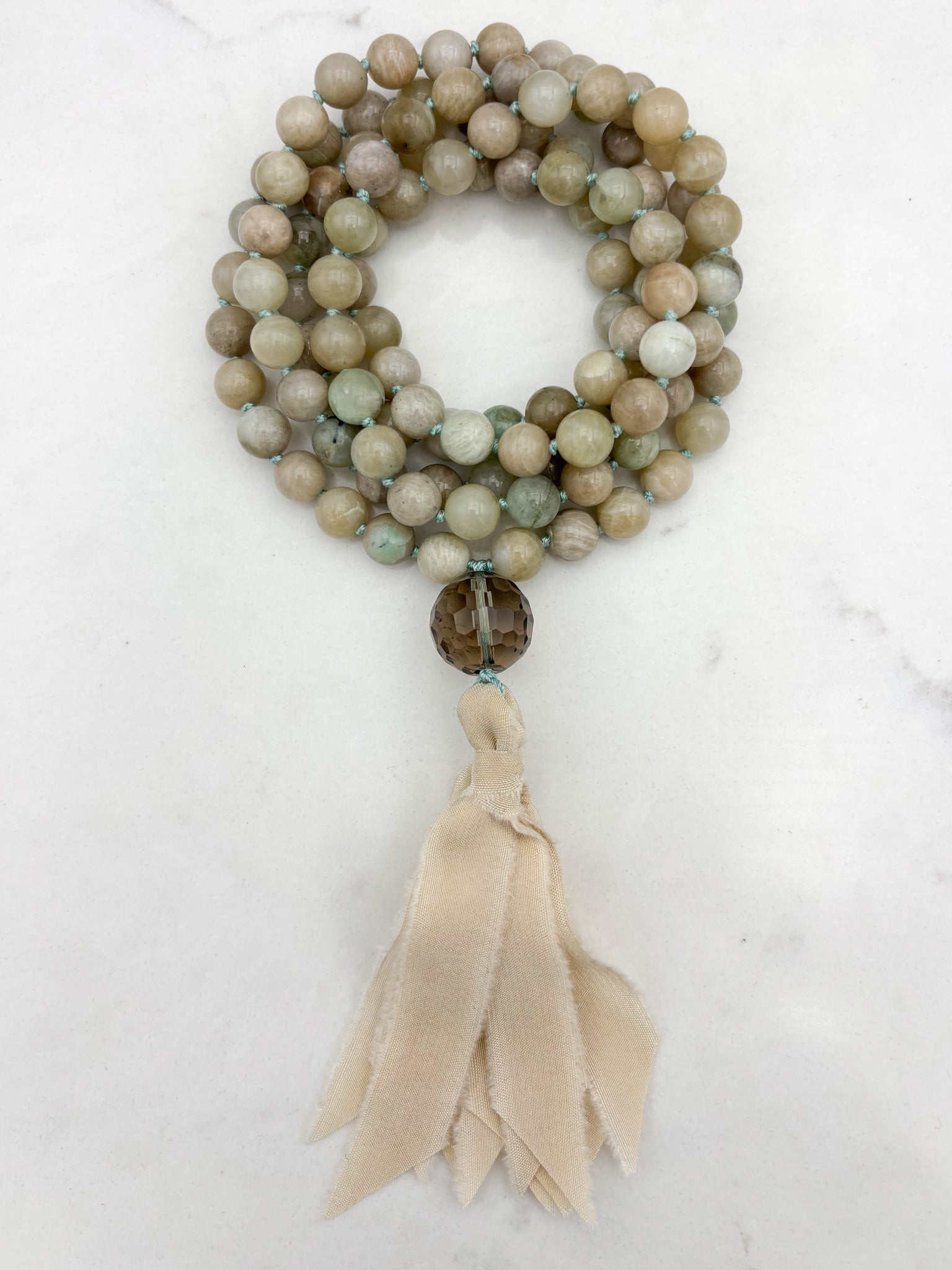 madagascar moonstone gemstone mala necklace with smoky quartz guru bead and cream silk tassel | handmade in boulder, colorado | radiant malas