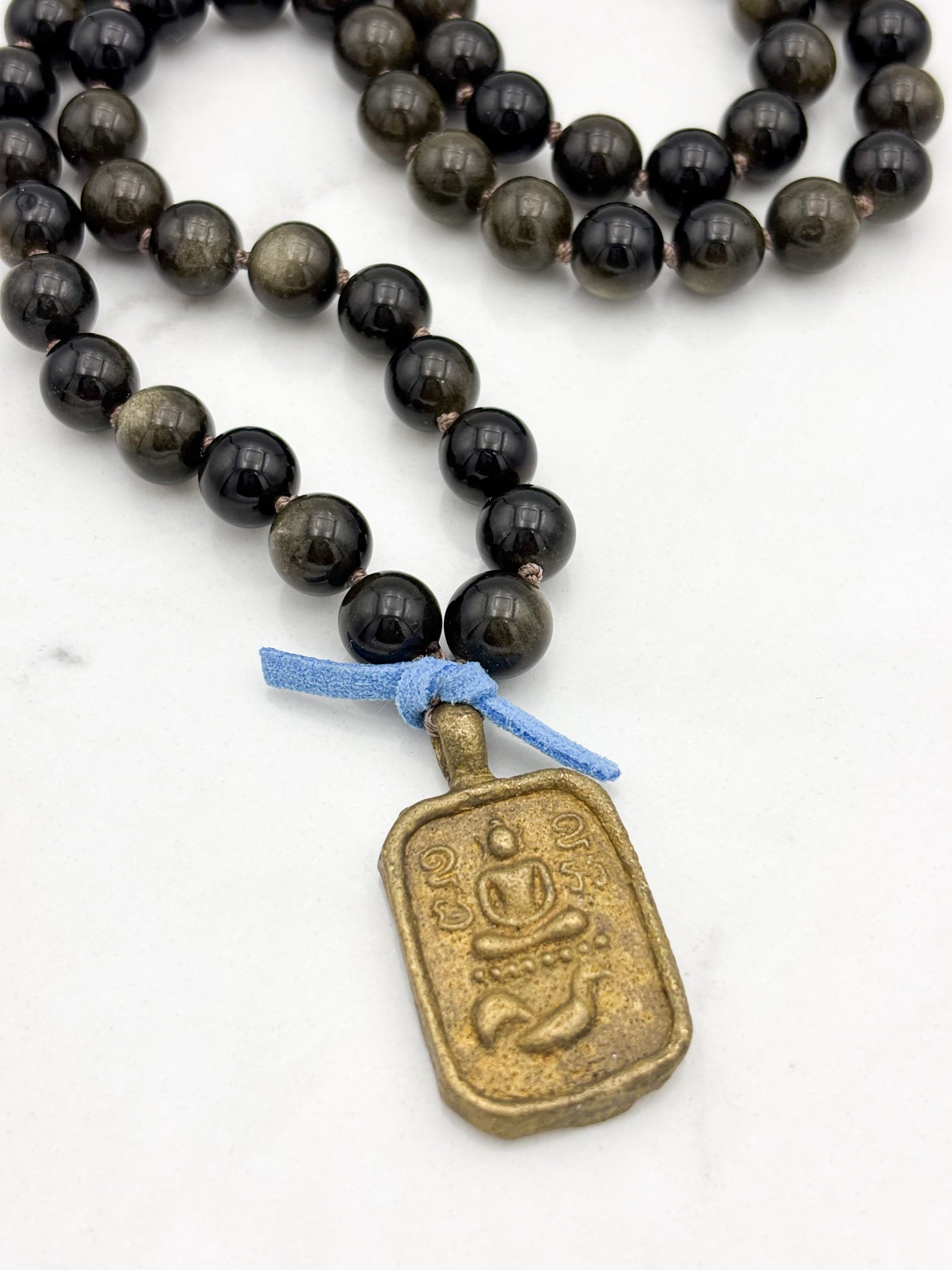 golden obsidian gemstone mala with Buddha pendant | radiant malas  handmade in boulder, colorado