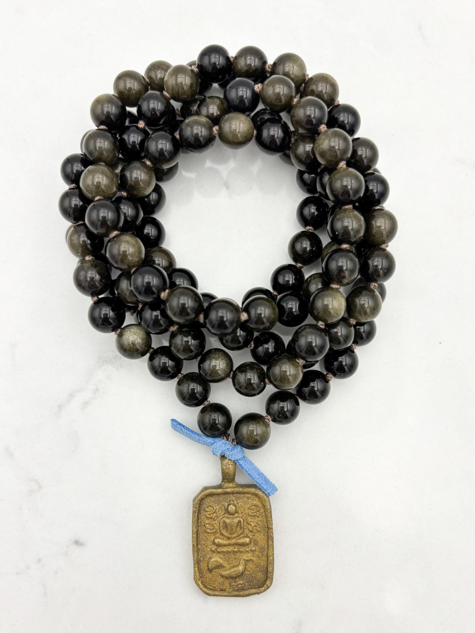 golden obsidian gemstone mala with Buddha pendant | radiant malas  handmade in boulder, colorado