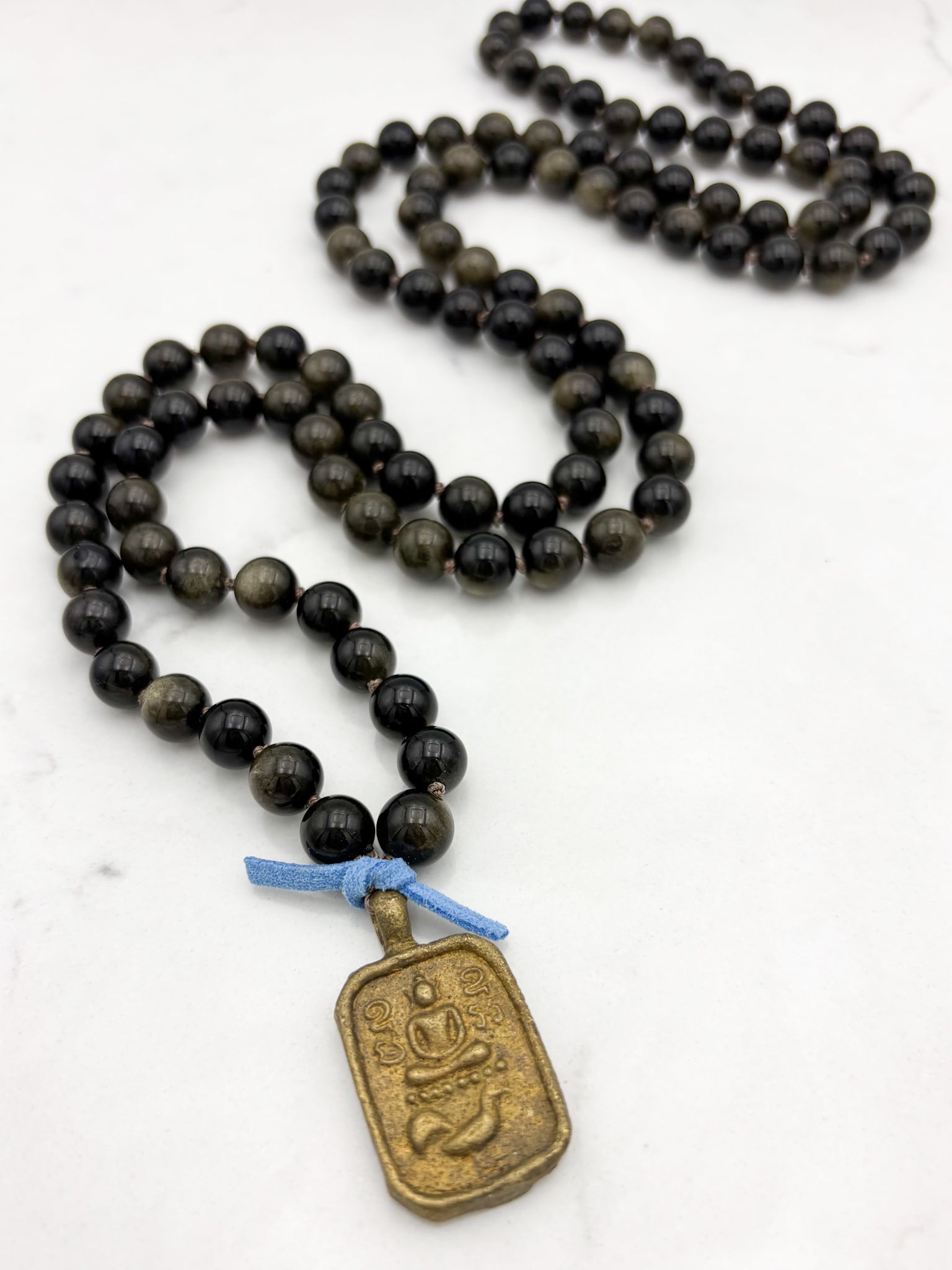 golden obsidian gemstone mala with Buddha pendant | radiant malas  handmade in boulder, colorado