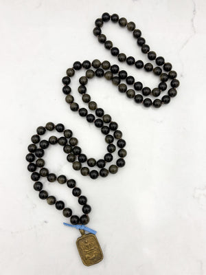 golden obsidian gemstone mala with Buddha pendant | radiant malas  handmade in boulder, colorado