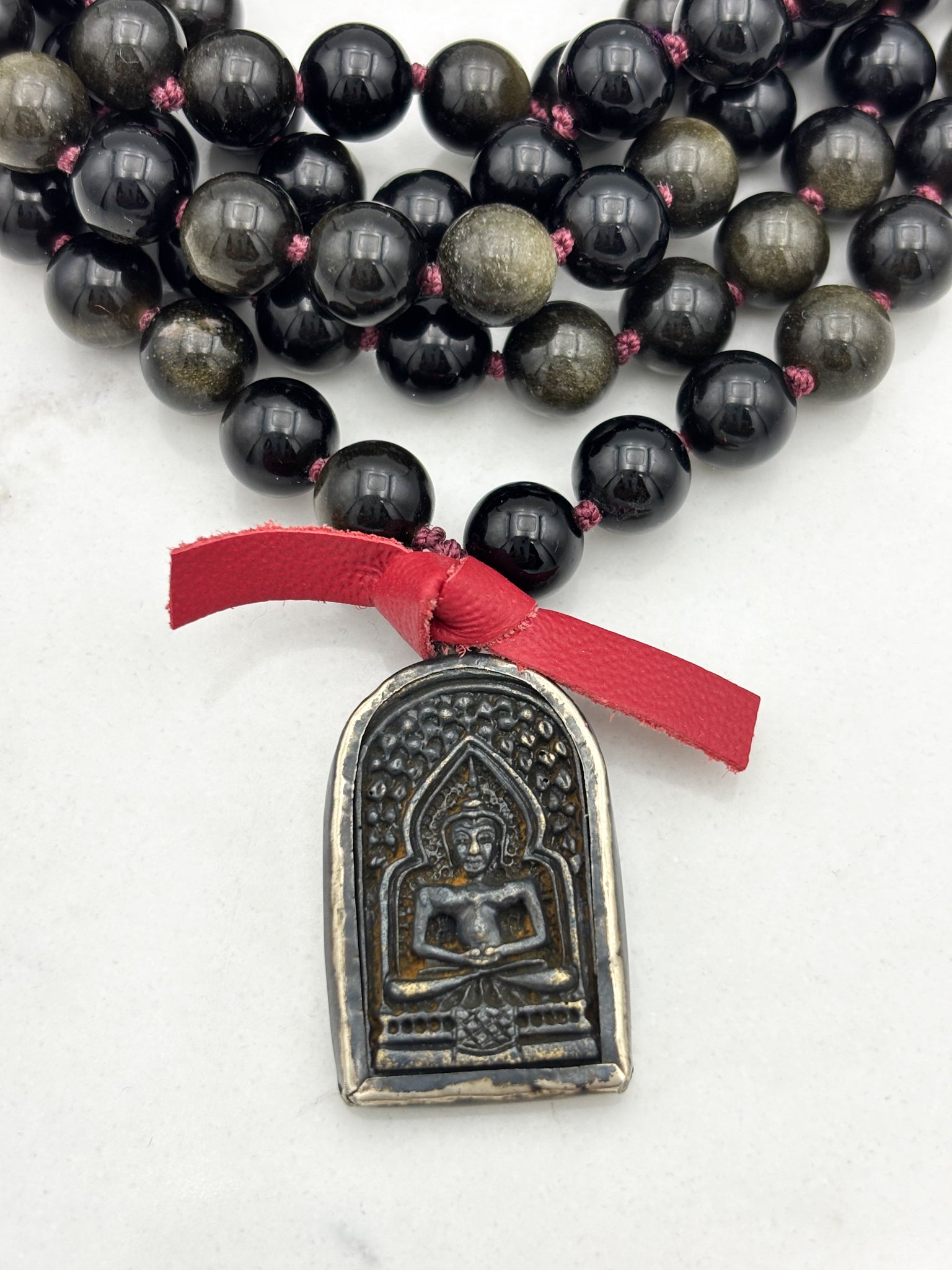 golden obsidian gemstone mala with Buddha pendant | radiant malas  handmade in boulder, colorado