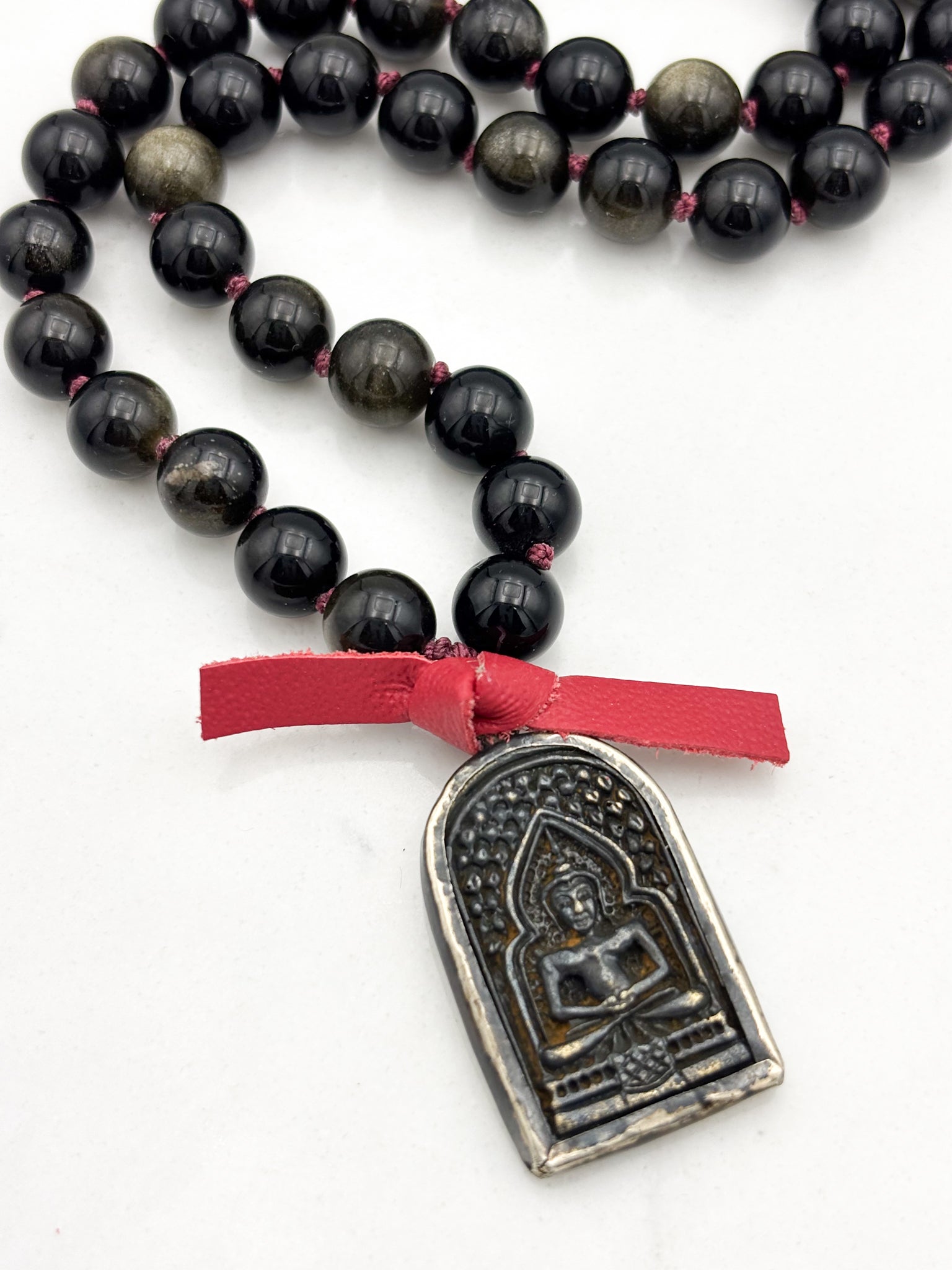 golden obsidian gemstone mala with Buddha pendant | radiant malas  handmade in boulder, colorado