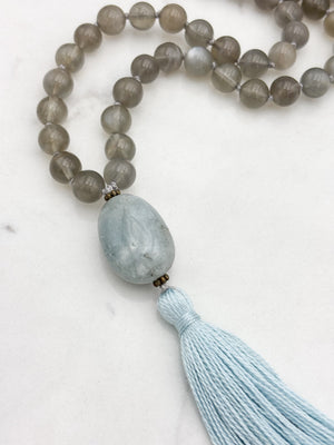 gray moonstone gemstone mala necklace with aquamarine guru bead and blue tassel | handmade in boulder, colorado | radiant malas
