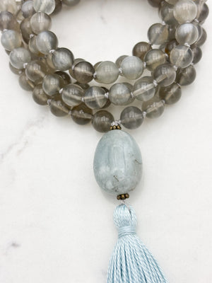 gray moonstone gemstone mala necklace with aquamarine guru bead and blue tassel | handmade in boulder, colorado | radiant malas