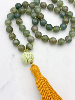 green apatite gemstone mala with carved lemon turquoise guru bead and gold tassel | radiant malas | handmade in boulder, colorado