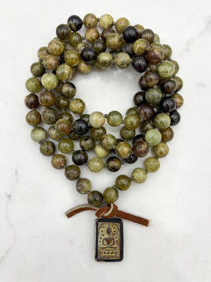 green garnet gemstone mala with vintage brass buddha pendant | radiant malas | handmade in boulder, colorado