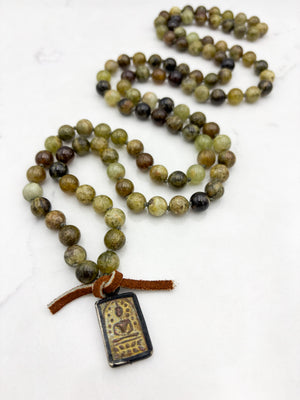 green garnet gemstone mala with vintage brass buddha pendant | radiant malas | handmade in boulder, colorado