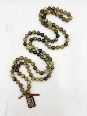 green garnet gemstone mala with vintage brass buddha pendant | radiant malas | handmade in boulder, colorado