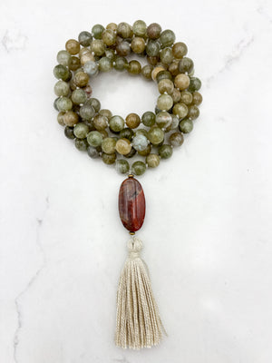 green garnet gemstone mala with red jasper guru bead and cream colored tassel | radiant malas | handmade in boulder, colorado