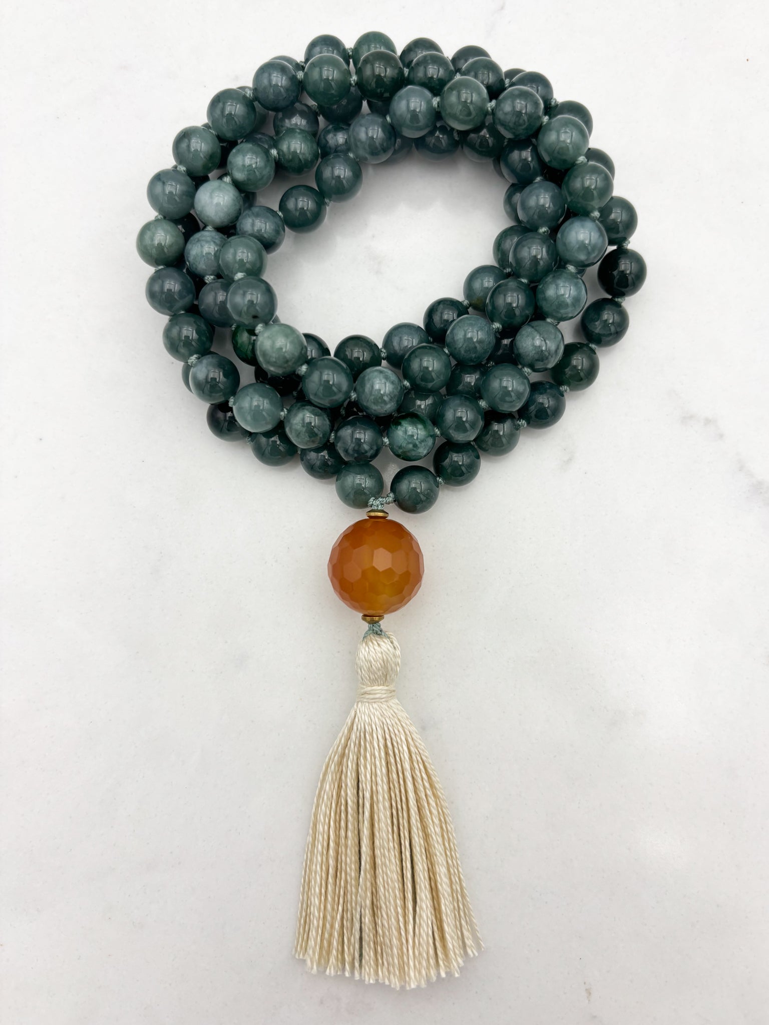 guatemalan jade gemstone mala with carnelian guru bead and cream tassel | radiant malas | handmade in boulder, colorado